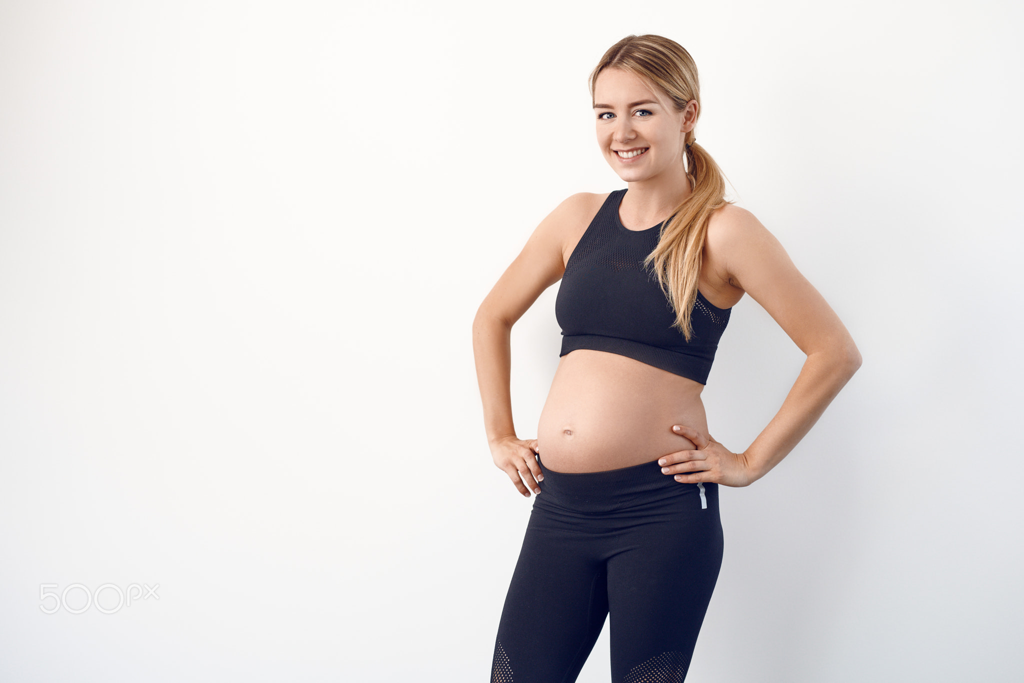 Happy healthy young pregnant woman