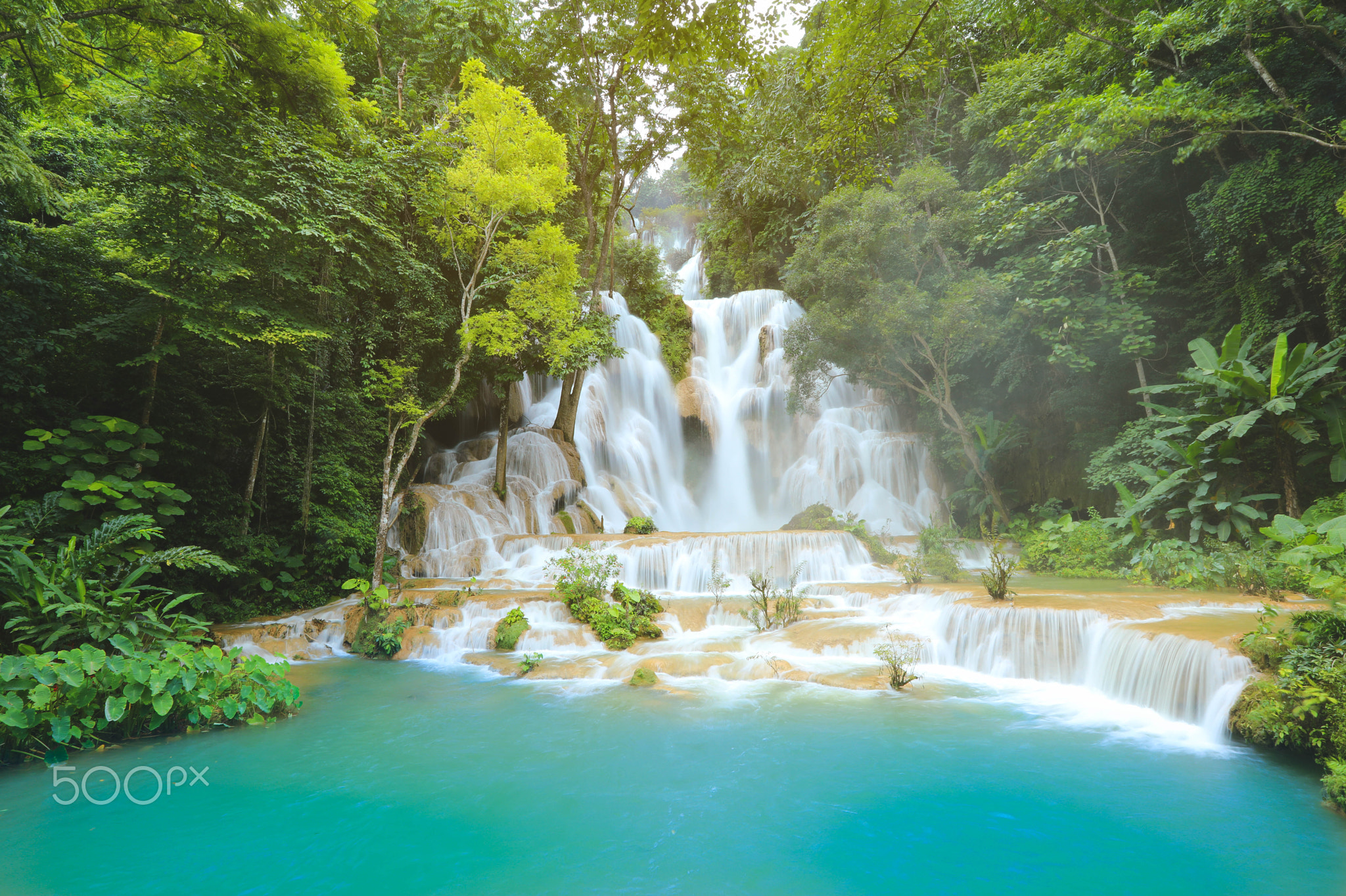 Kuang Si Waterfalls in Luang Prabang Laos. Long exposure. Beautiful waterfall in wild jungle
