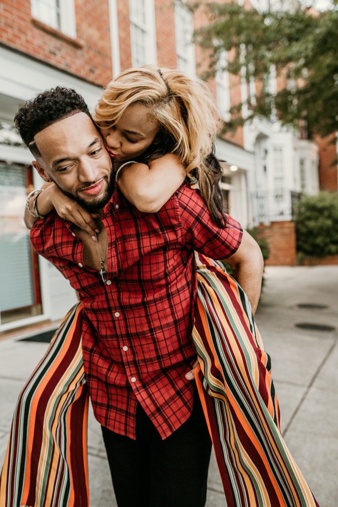 Diverse Couple Walking Through the City by Jason Hampden on 500px.com