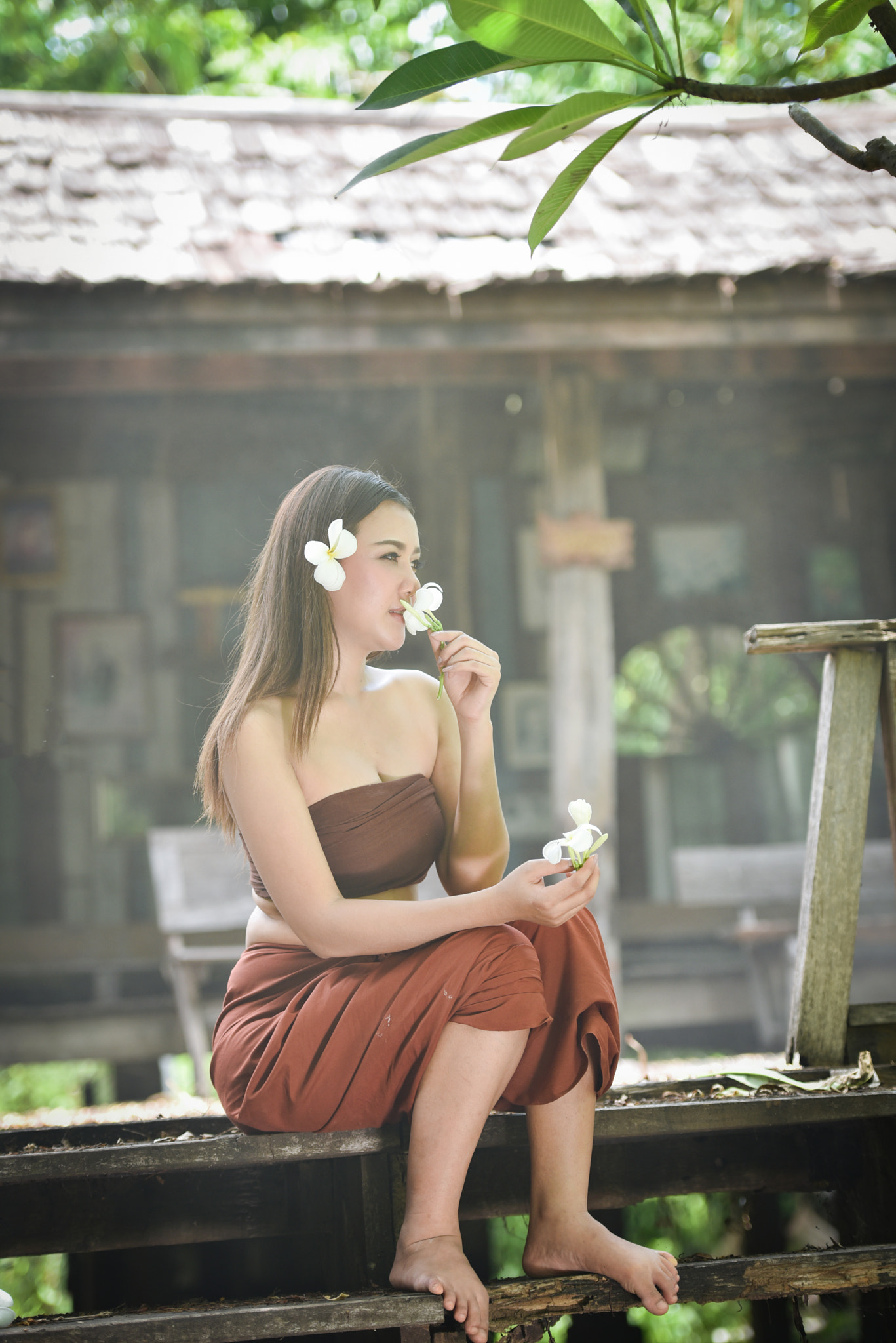 Asia woman thai drama style dress and Sniffing flowers / Portrai