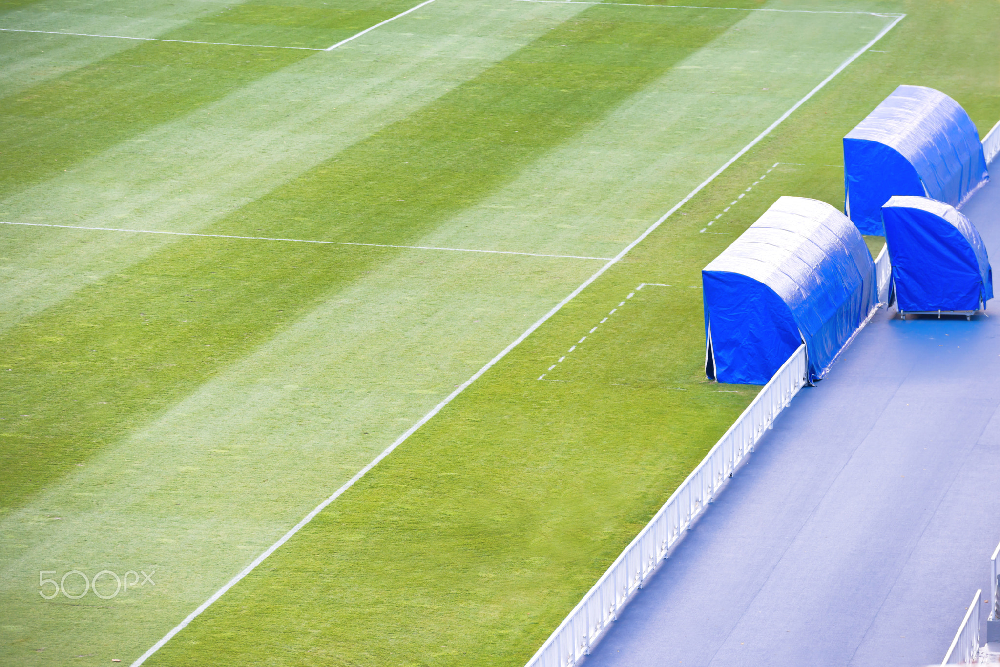 Football soccer field with coach bench