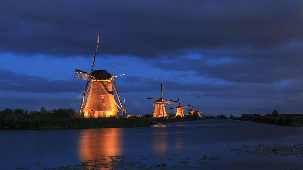 Windmills in the spotlight by Theo Mathijssen / 500px