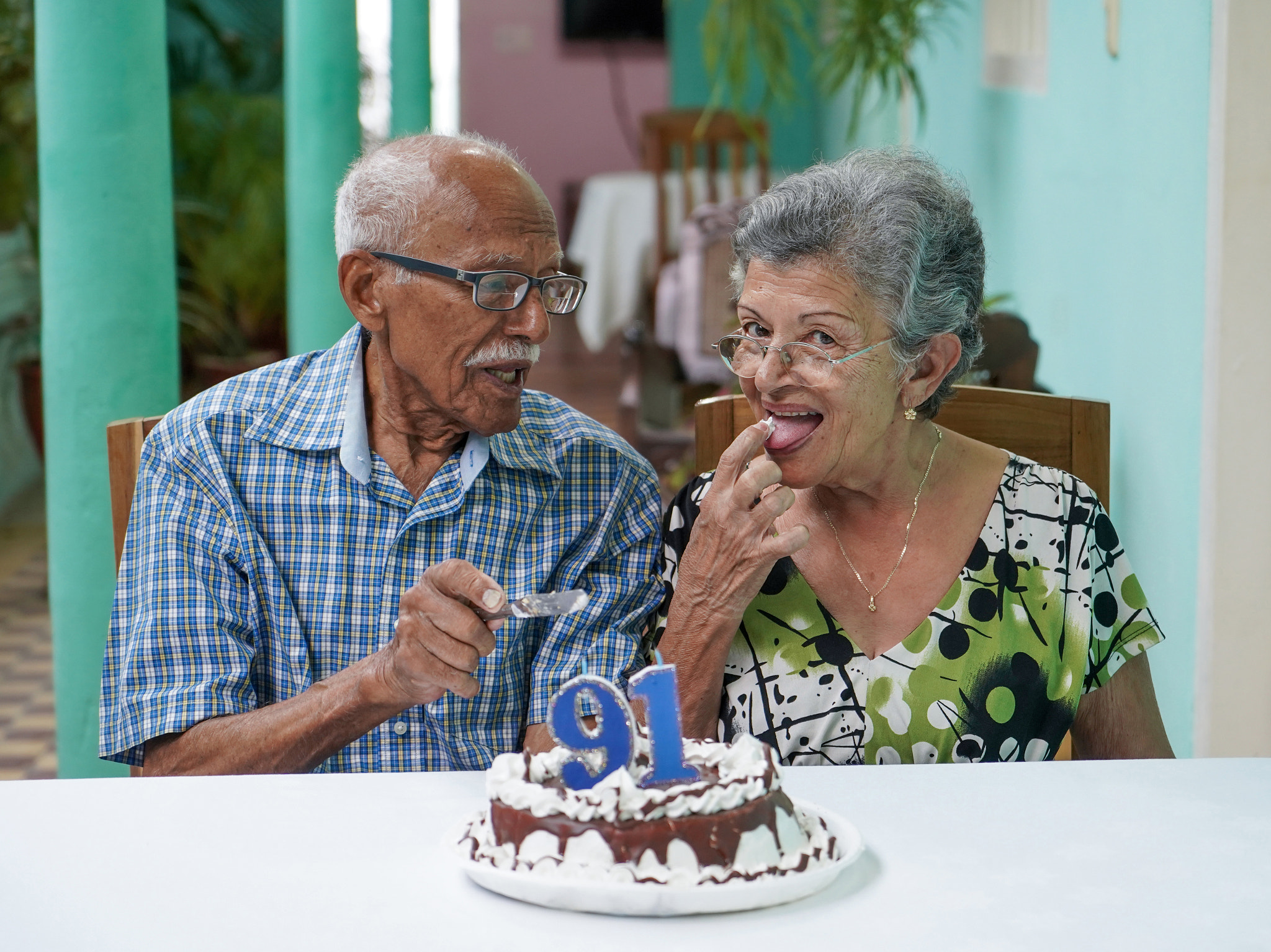 Elder couple celebrating man's 91 st birthday