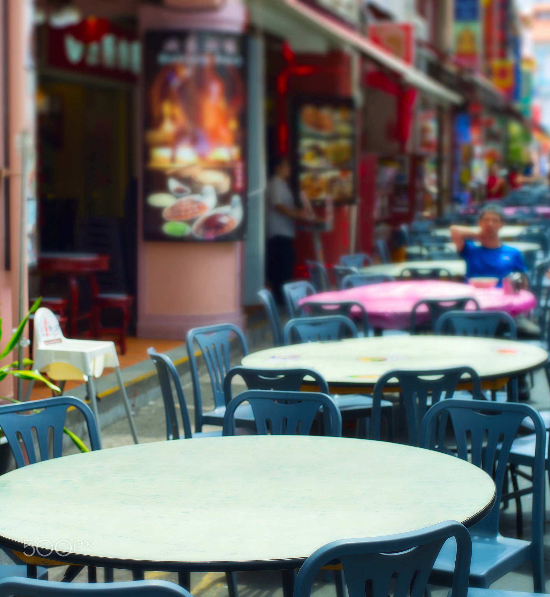 Street restaurant tables. Singapore Chinatown