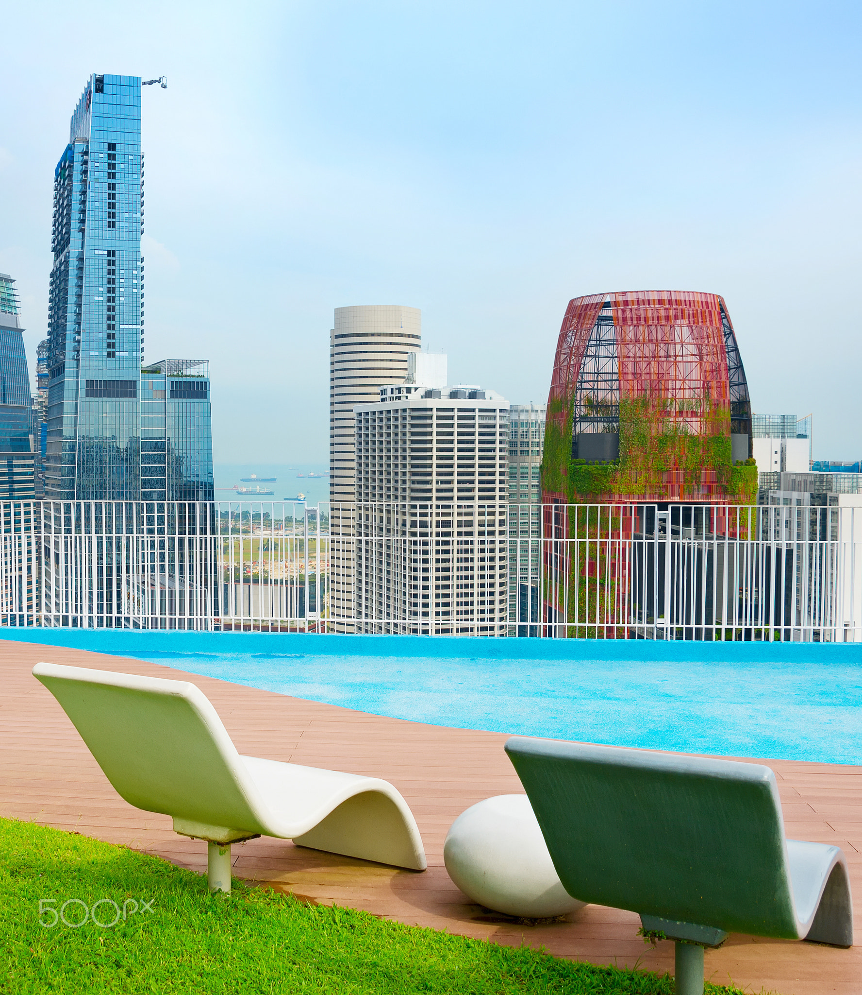 Rooftop deck chairs. Singapore Downtown