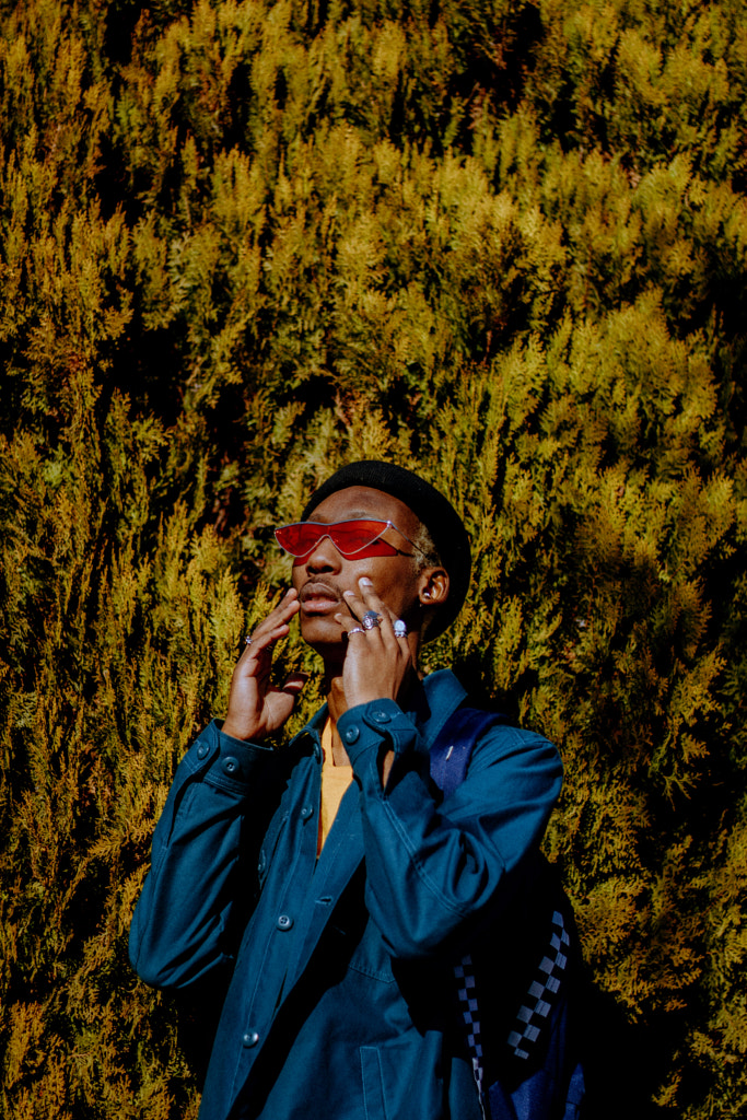 Young Nigerian Man Posed With Hands On Face by Hagar Wirba on 500px.com