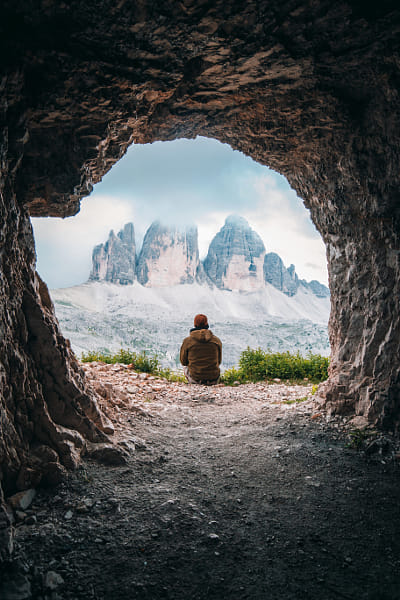 A guy admiring a beautiful mountain landscape by Andrea Dal Soglio on 500px.com