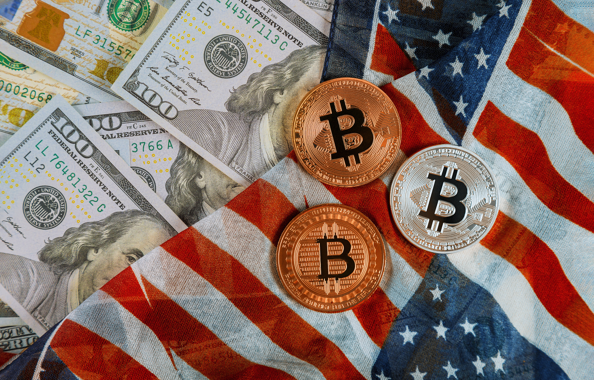 Golden Bitcoin on US dollars digital currency with US flag