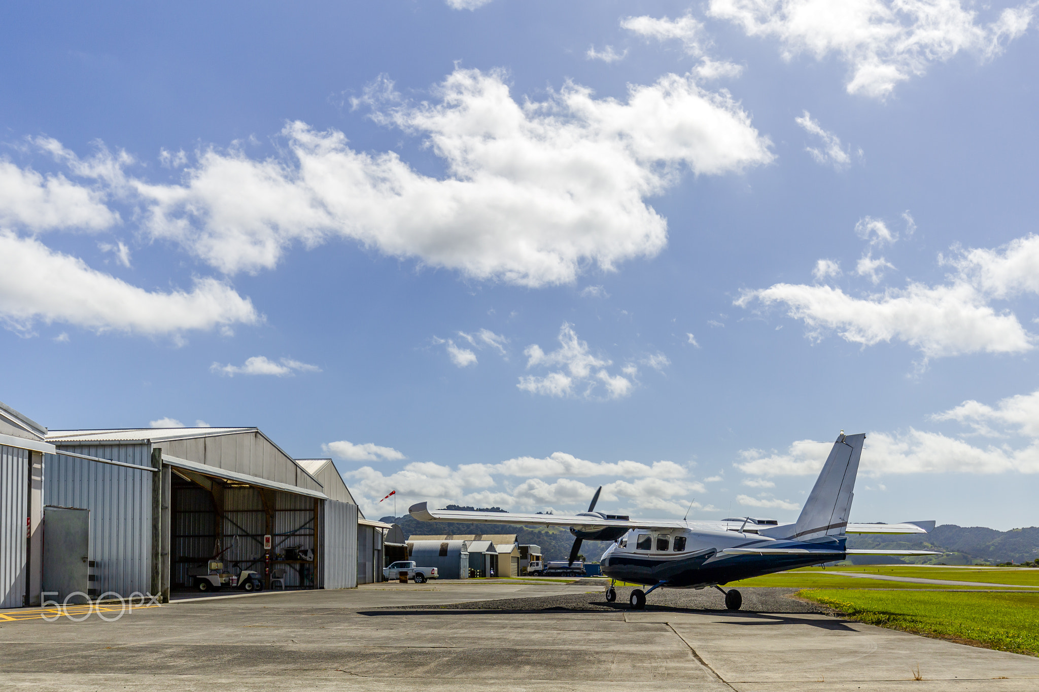 View of an aeroplane outside of a hangar