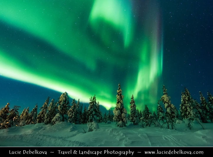 Finland - Northern Lights over Frozen world of Arctic Lapland