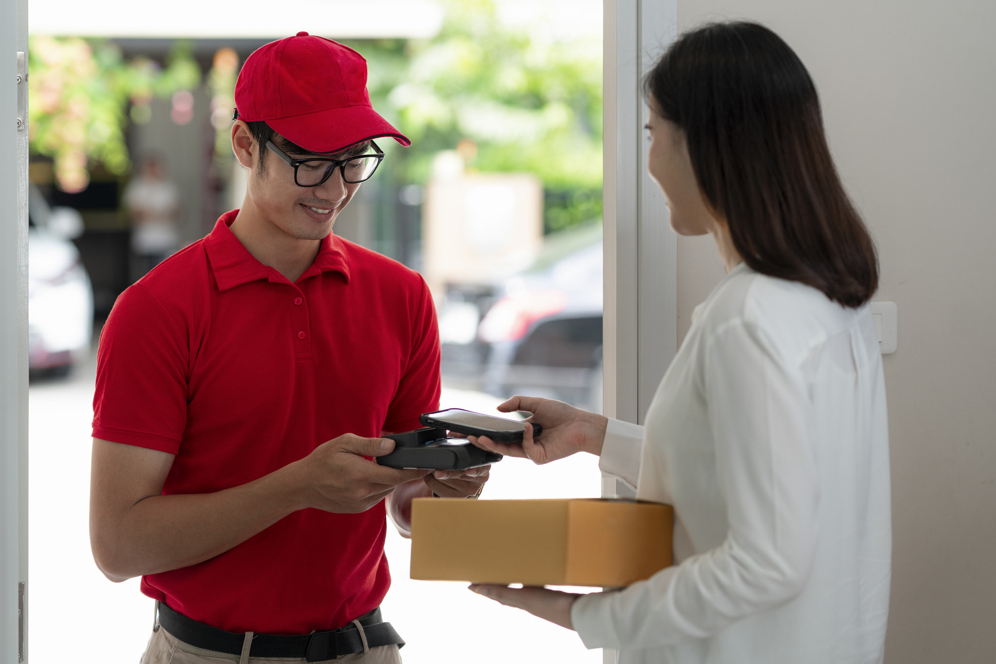 home delivery service man in red uniform