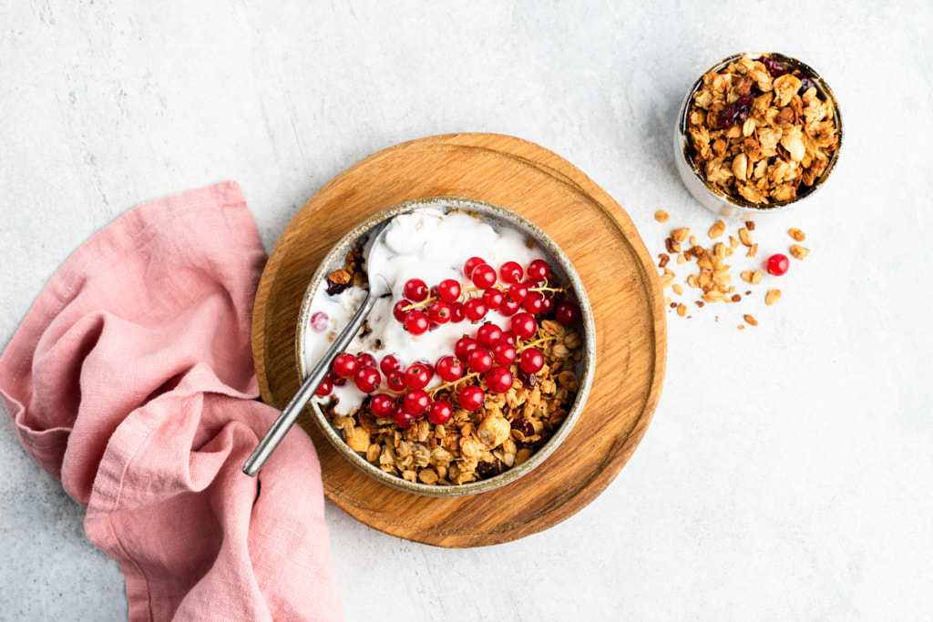 Breakfast cereal oat granola with yogurt and berries by Vladislav Nosick on 500px