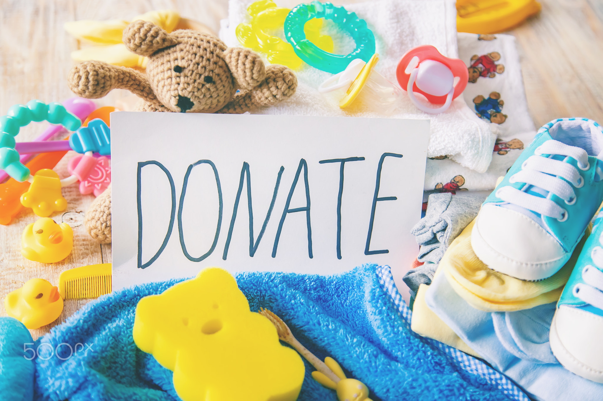 Baby clothing and donation accessories. Selective focus.