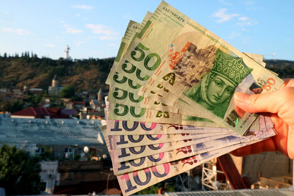 Bunch of the Georgian 50 banknotes Showing the Obverse Side with Blurry Tbilisi City View in Backgro by SAWASSAKORN MUTTAPRAPRUT on 500px.com