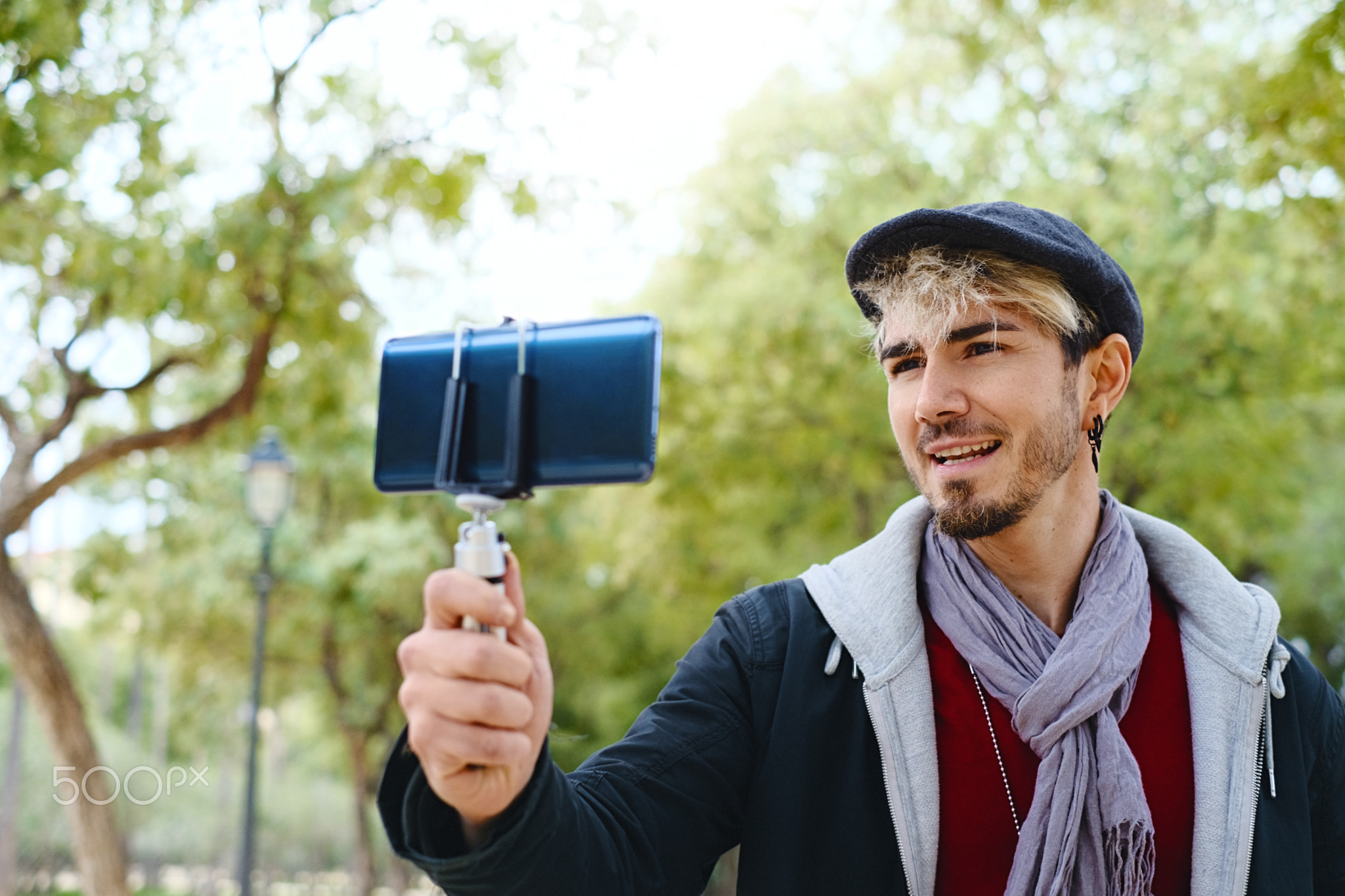 Millennial Man Recording Vlog With Mobile Phone For Social Media