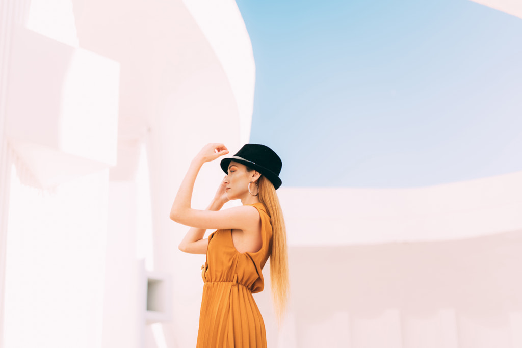 Young Woman in Orange Dress traveling by Petar Tutundziev on 500px.com