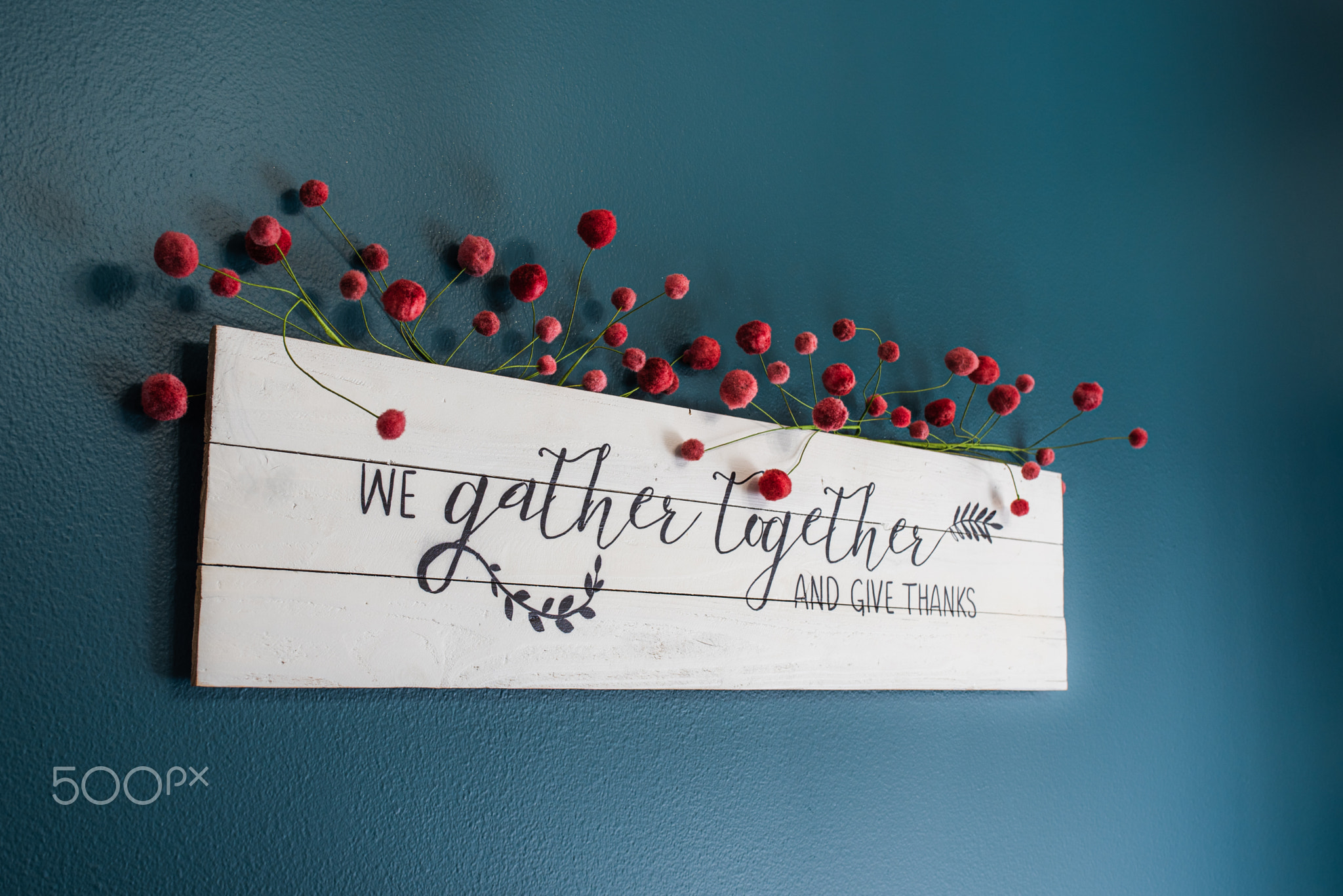 we gather together and give thanks sign on the wall