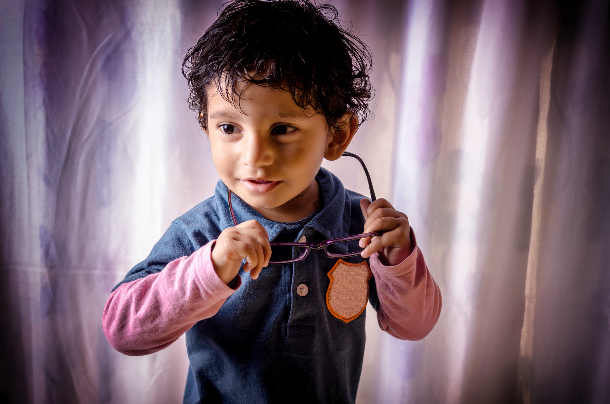 Portrait of child wearing glasses