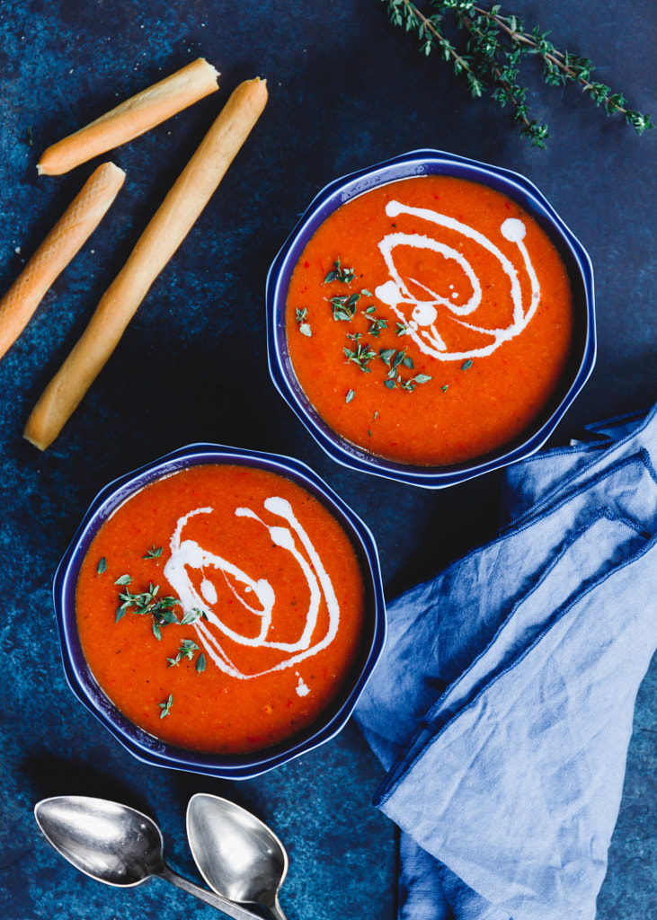 Top view of two portions of red tomato cream soup. by Edalin Photography on 500px.com