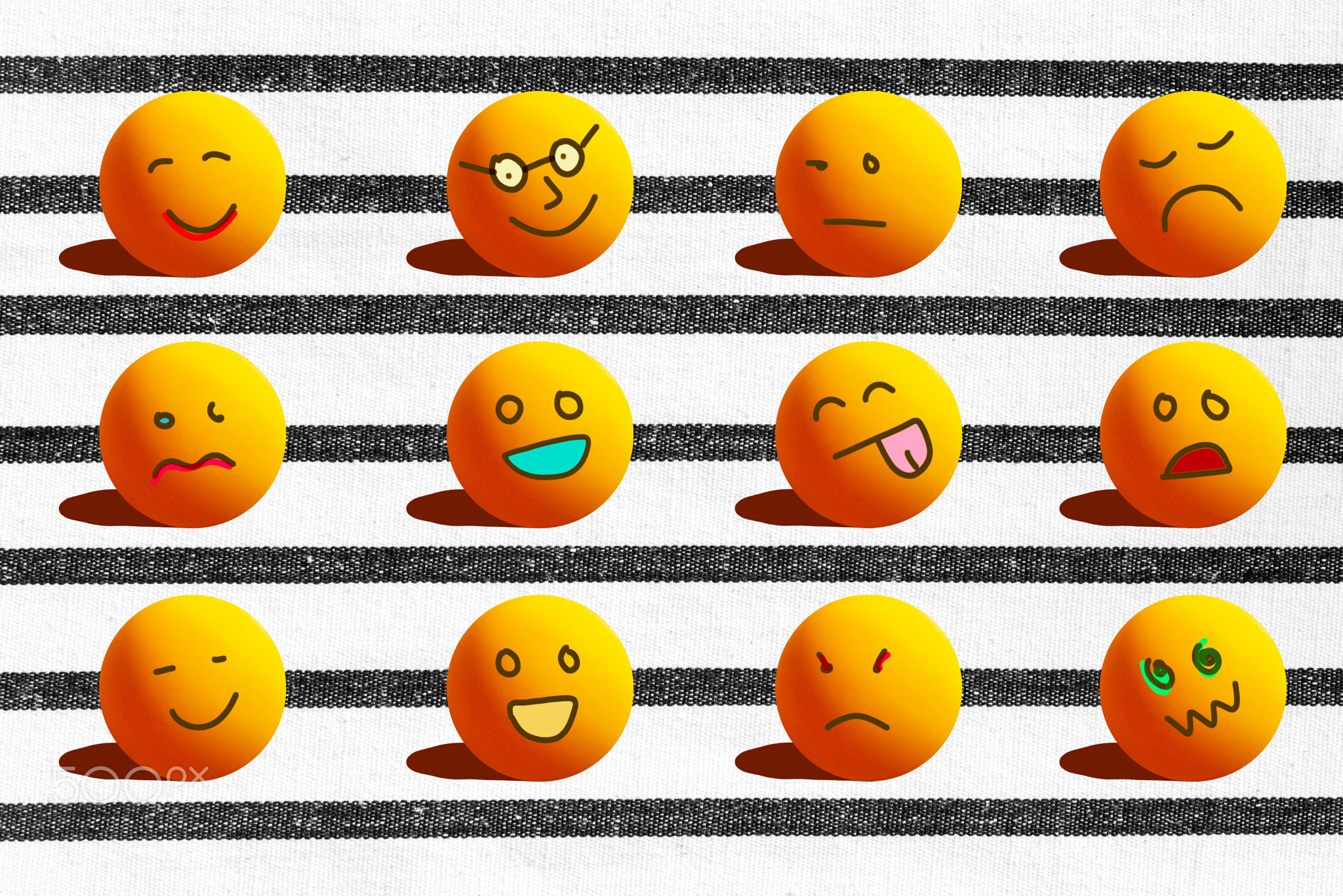Different emoticons face like sad angry happy smile on ping pong ball.