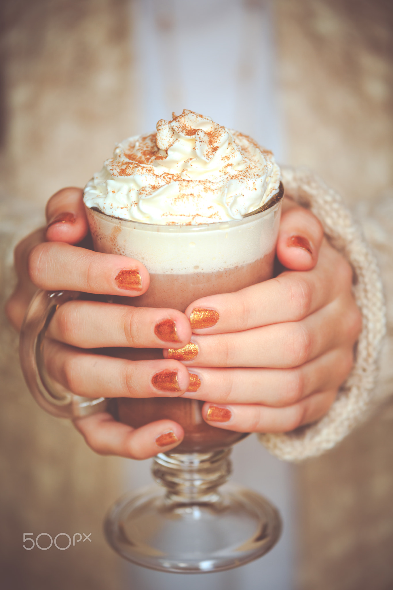 Girl holding cacao with whipped cream. Christmas holiday concept