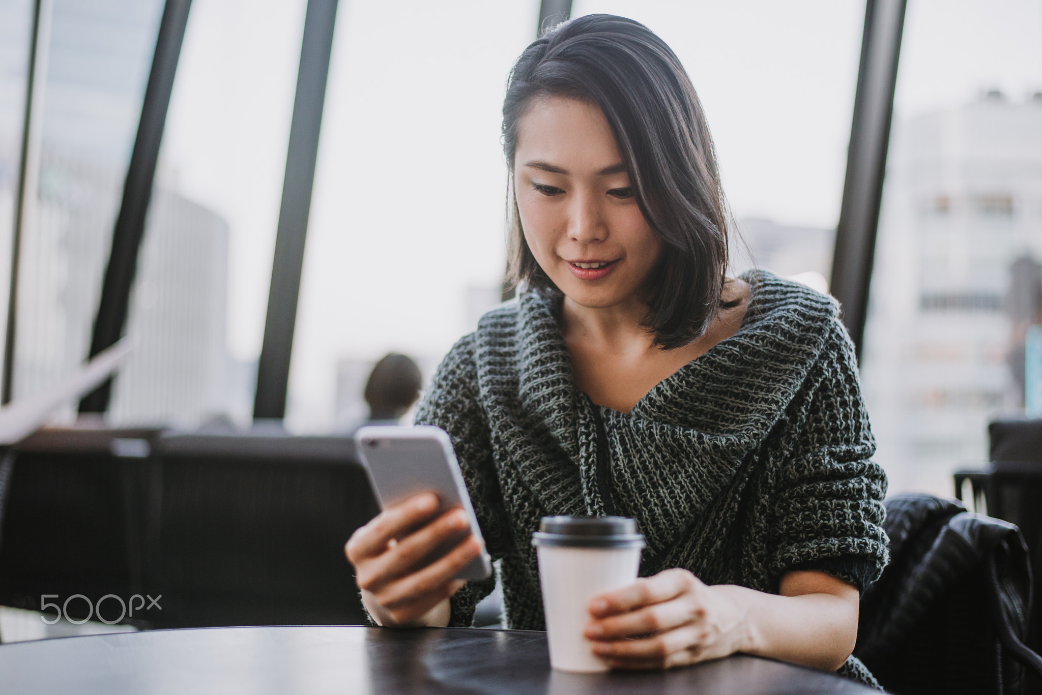 Japanese girl having coffee