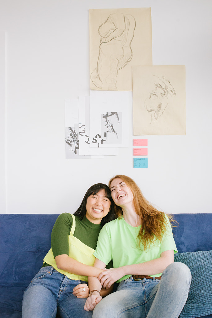 Two friends sitting on a couch, Claire W and Victoria B by PAM LAU on 500px.com