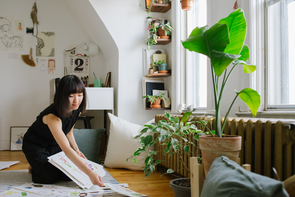 Artist sorting paintings at home, Justine W by PAM LAU on 500px.com