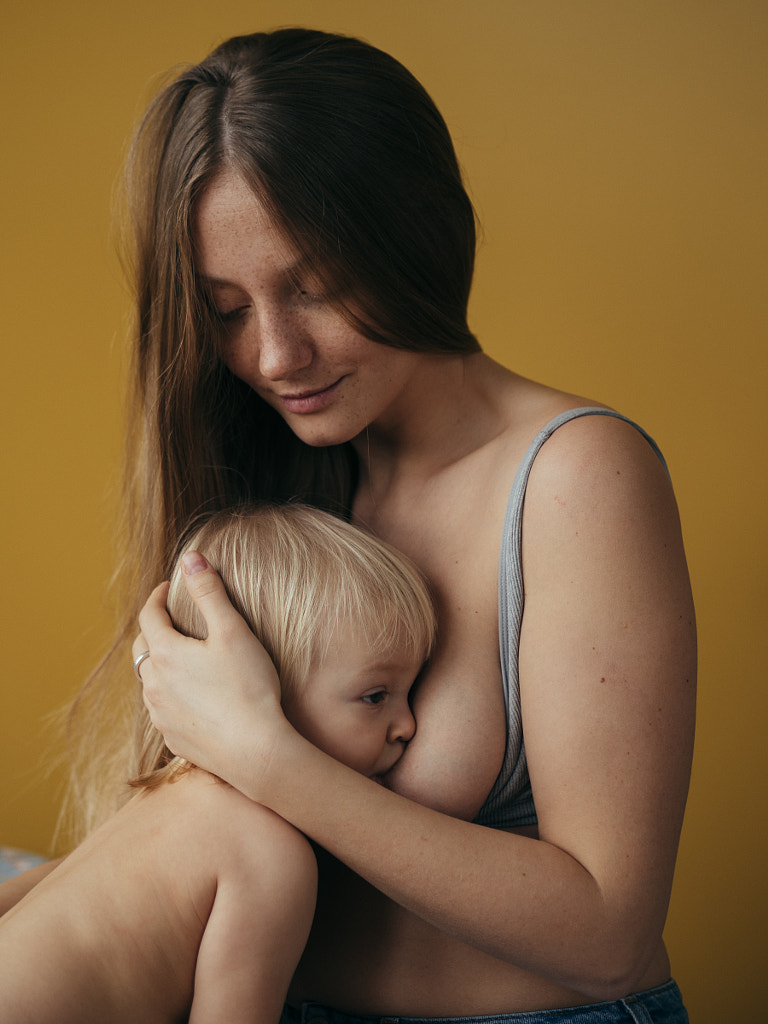 woman breast feeding her baby, Russia, Kristina Davidenko by Aks Huckleberry on 500px.com