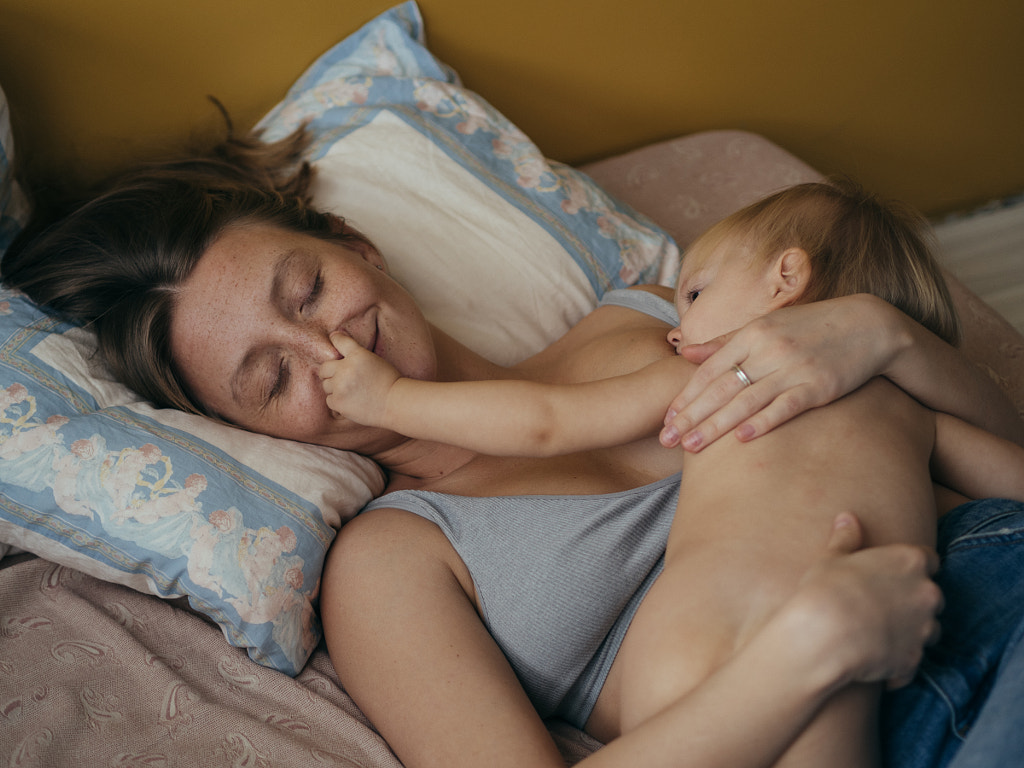 woman breast feeding her baby, Russia, Kristina Davidenko by Aks Huckleberry on 500px.com