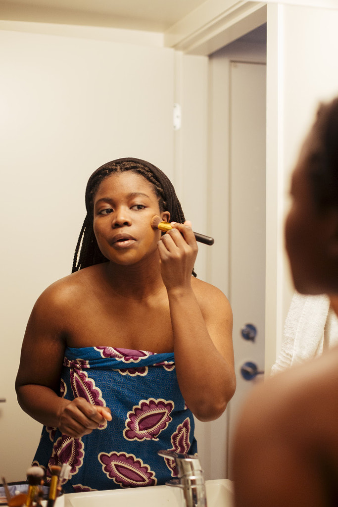 Young woman Applying Make-up in mirror, Delator "Dela" Hini by Hagar Wirba on 500px.com
