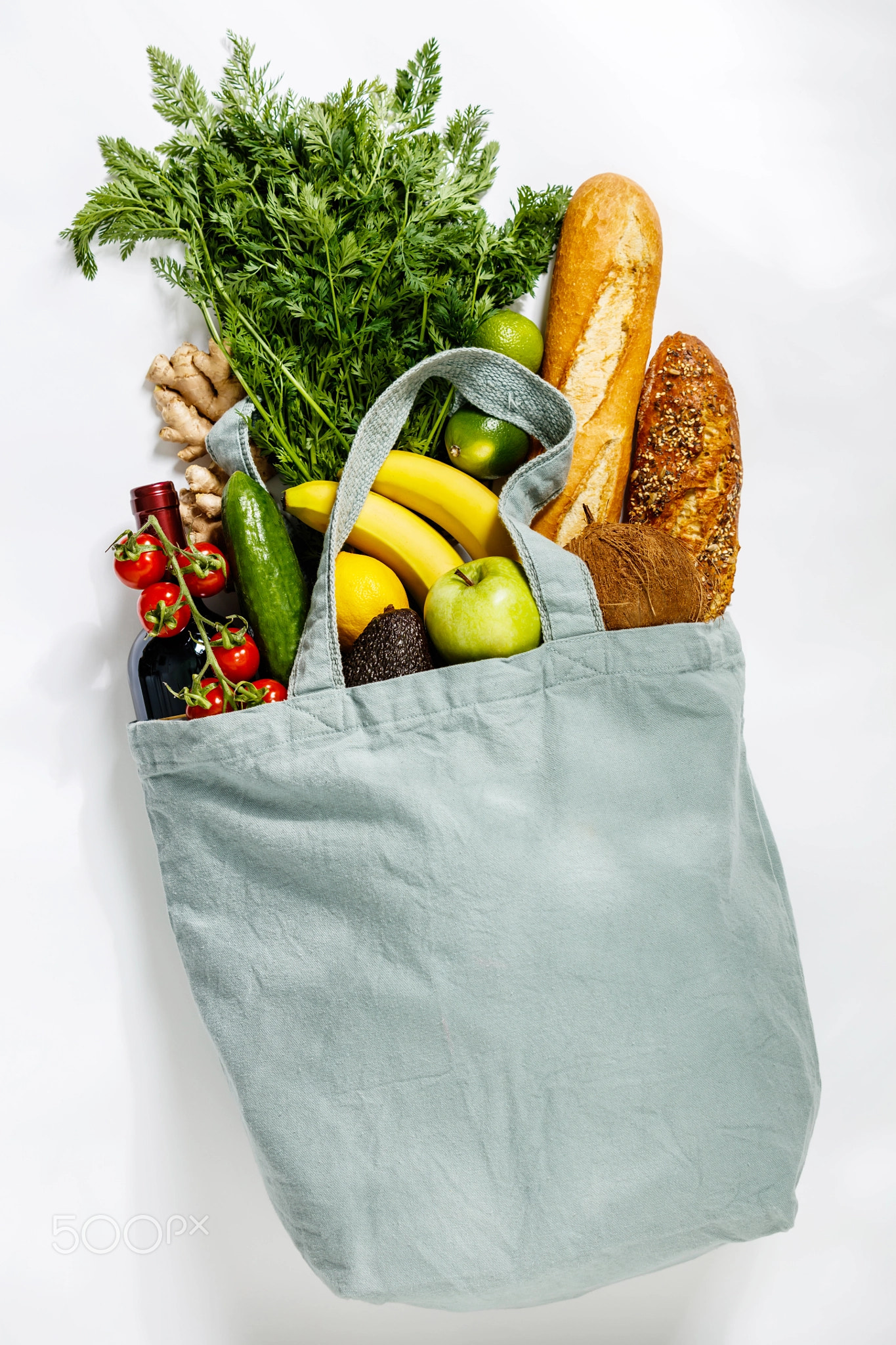 Eco friendly reusable shopping bag filled with organic food