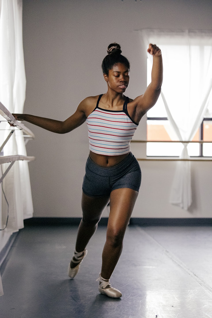 Young woman dancing in front of dance studio, Oluwatosin Etuhoko by Hagar Wirba on 500px.com