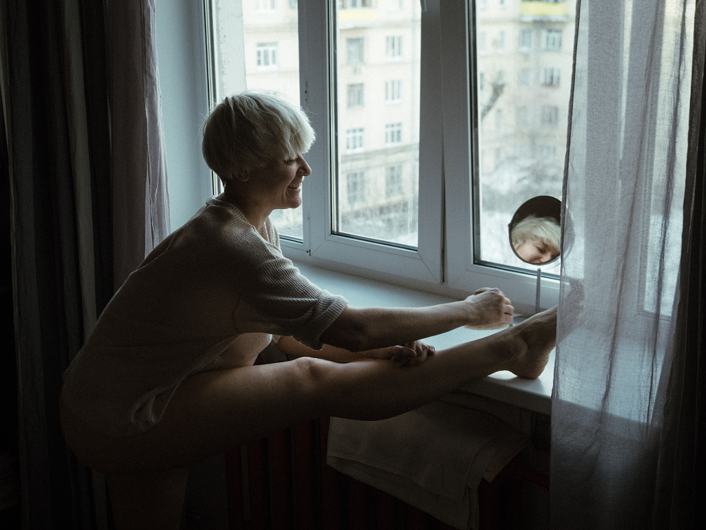 woman performing selfcare routine with a brush,Russia,Irina Passadskay by Aks Huckleberry on 500px.com