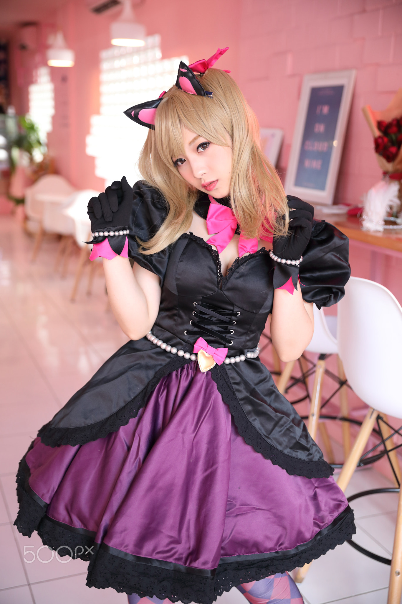 Japan anime cosplay , portrait of girl cosplay in pink room background