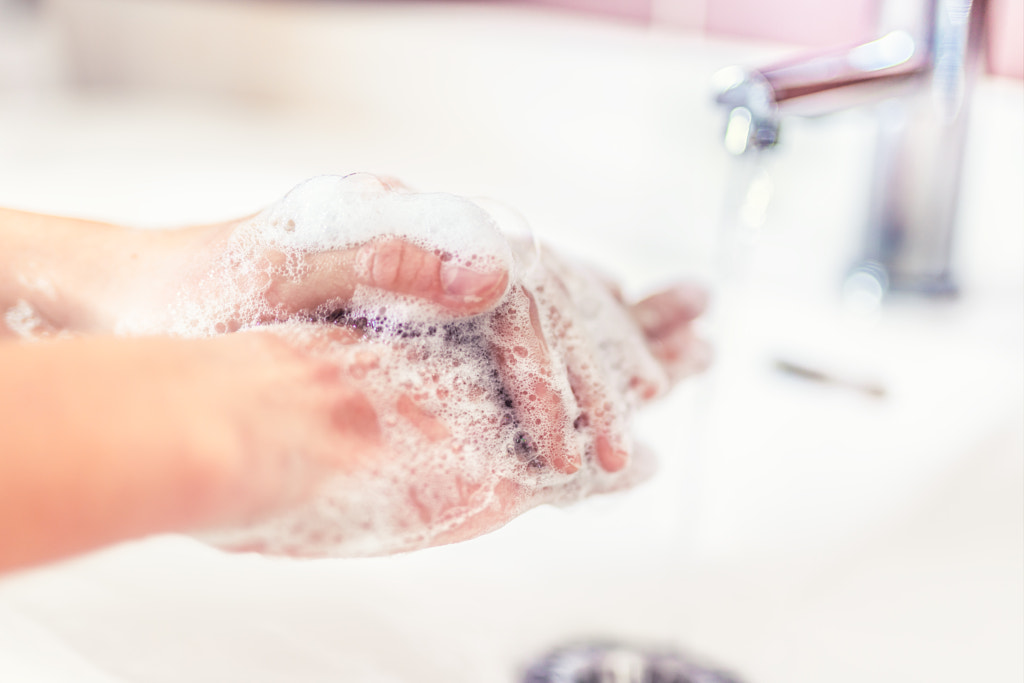 Washing hands with water and liquid soap in the bathroom. Hygiene anti by Marian Vejcik Slovcar on 500px.com