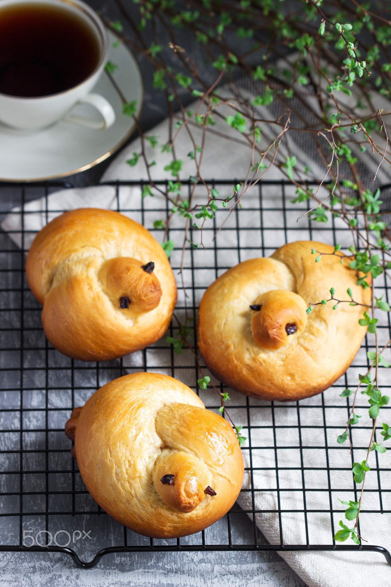 Traditional spring bird-shaped lean buns coated with sweet syrup.