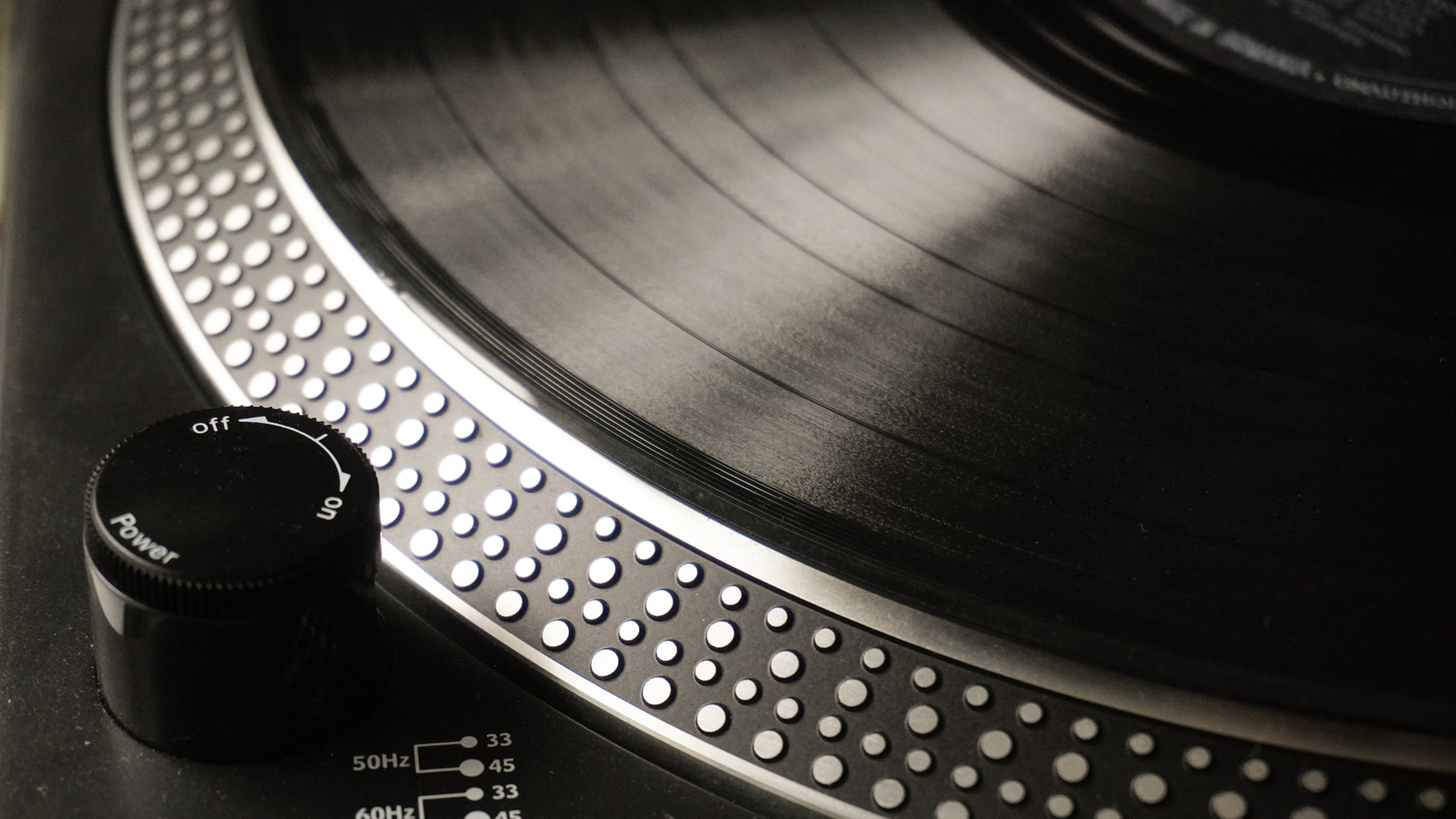 Vinyl turntable closeup. Retro audio device for music or Dj