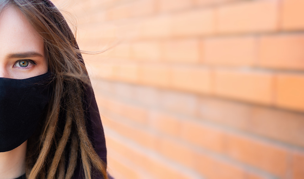 Close-up portrait of girl with dreadlocks and green-blue eyes, wearing by Alexander Dadyev on 500px.com