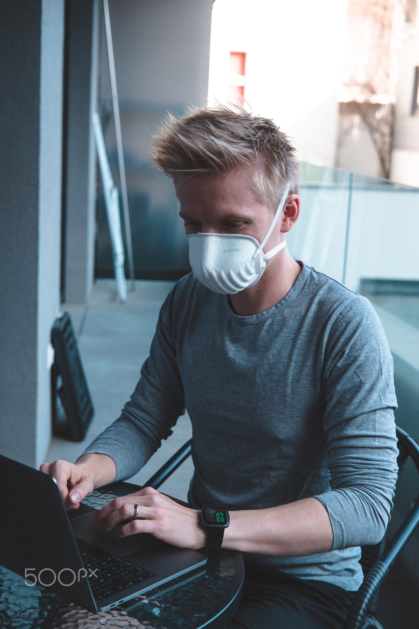 Man wearing FFP3 face mask respirator against flu