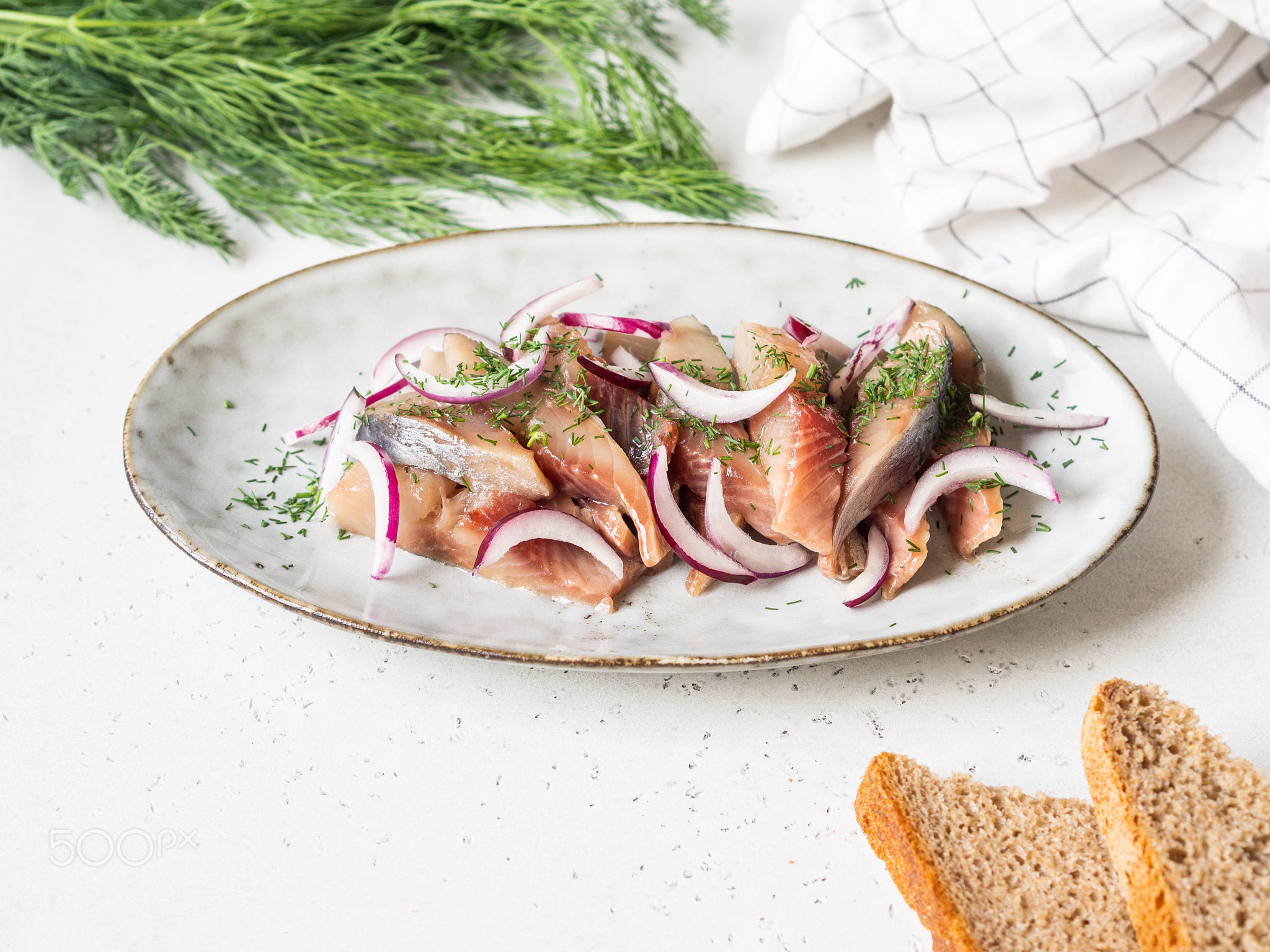 Marinated Herring fish slices.