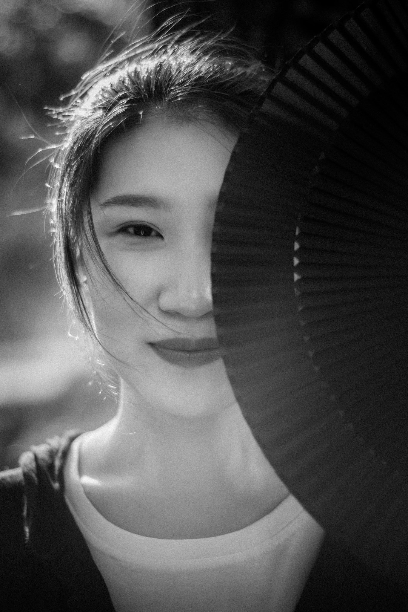 Girl with a black fan