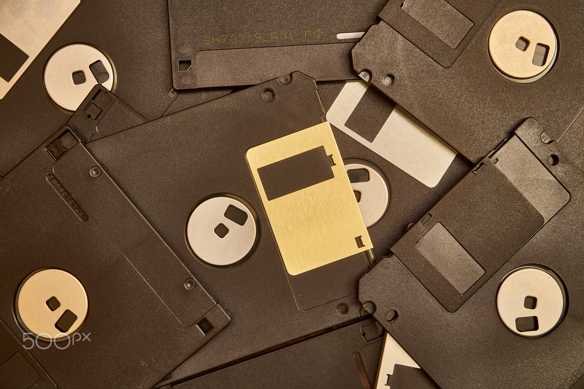 a lot of black floppy disks for the computer