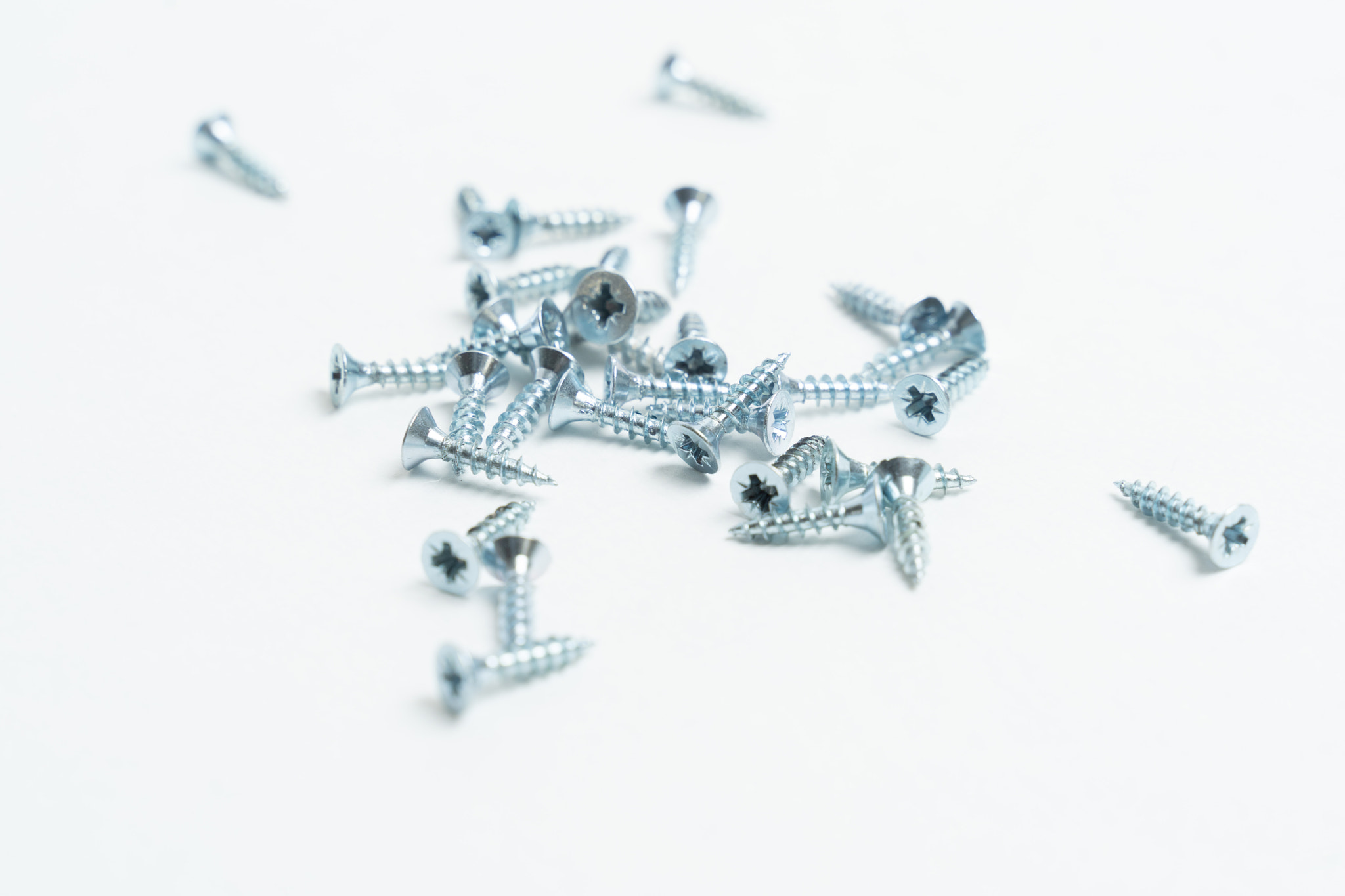 metal screws 16 mm long bolts for furniture on a white background