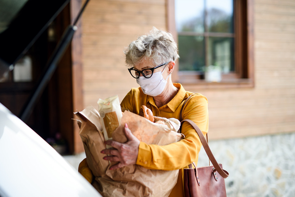 Senior woman with face mask outdoors with shopping, corona virus and by Jozef Polc on 500px.com