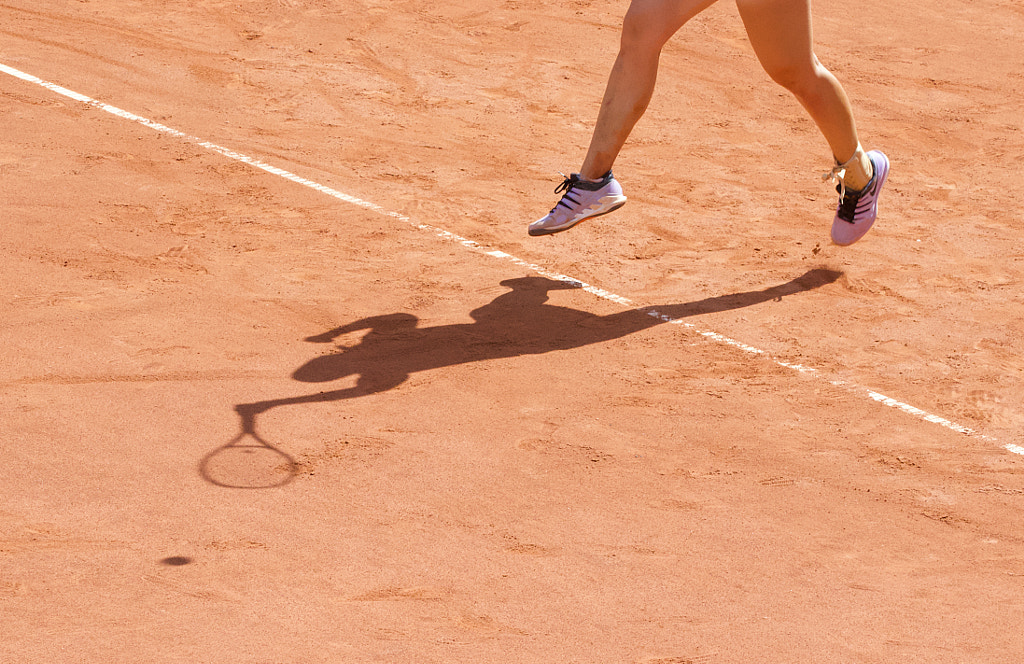 Tennis player and shadow. by Tomas Gaubys on 500px.com