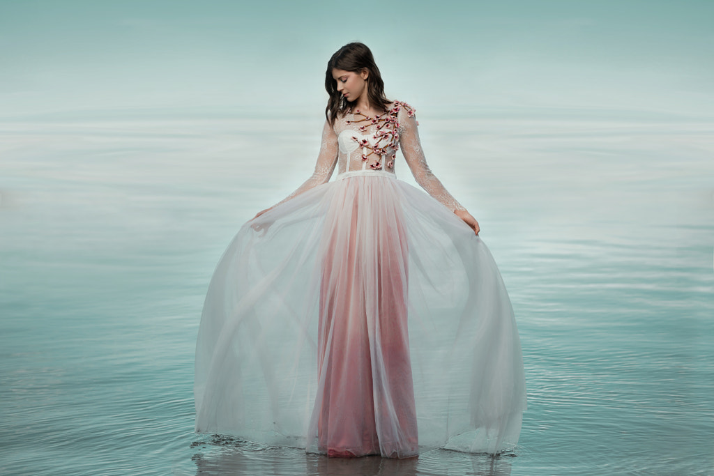 Full length shot of beautiful young woman in dress standing on water by Tamara Savkovic on 500px.com