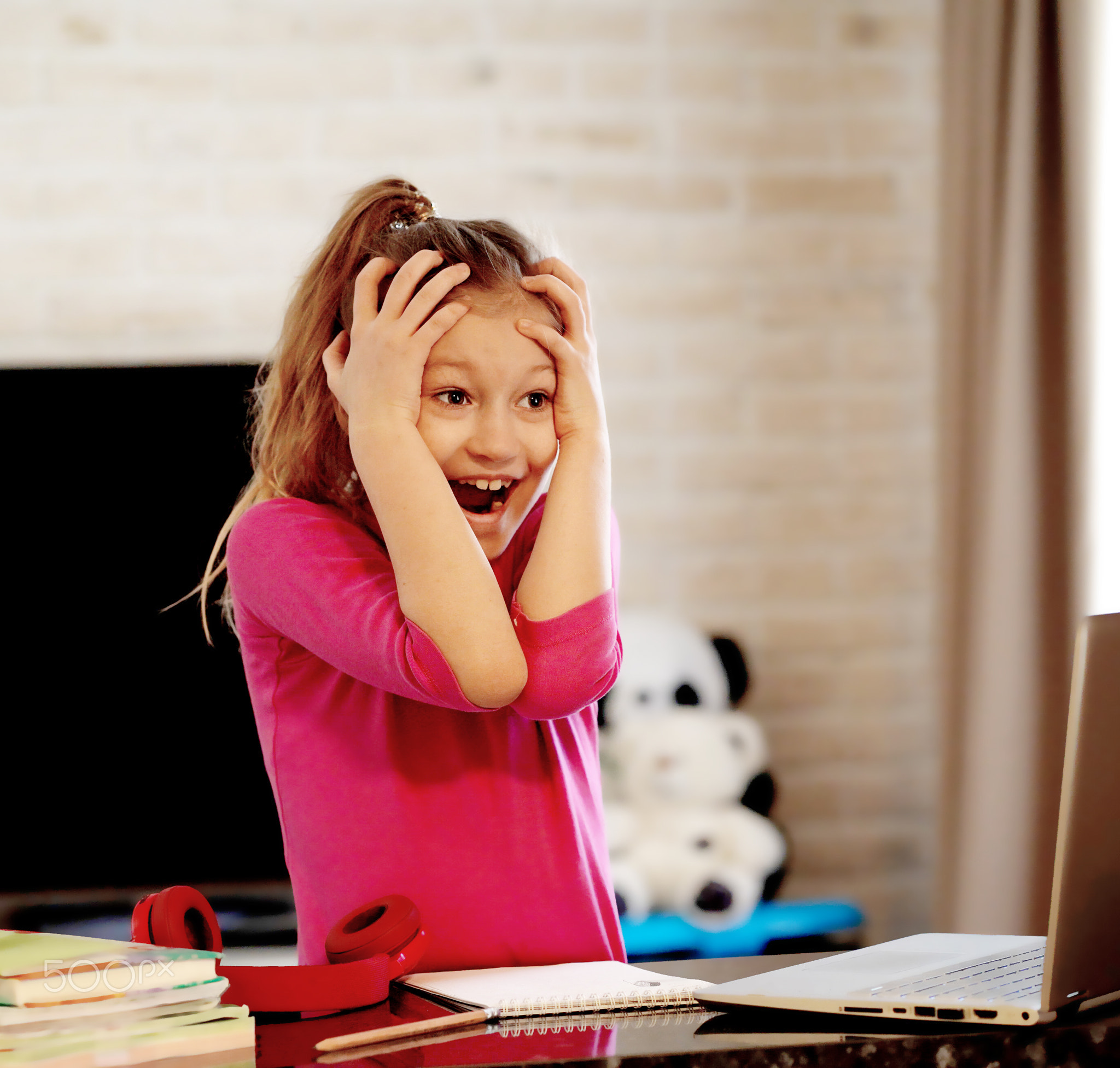 Emotional portrait of schoolgirl studying homework, home schooler