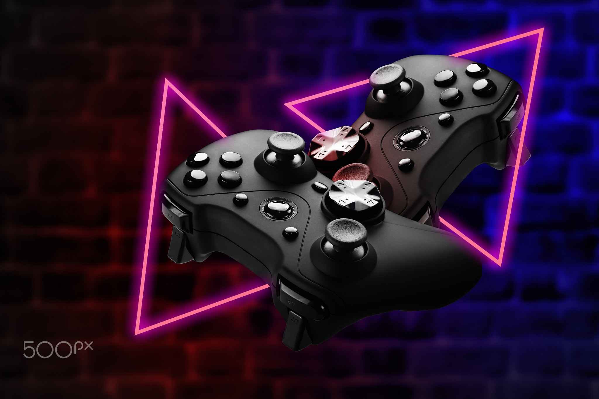 Gamepad on a dark brick background.