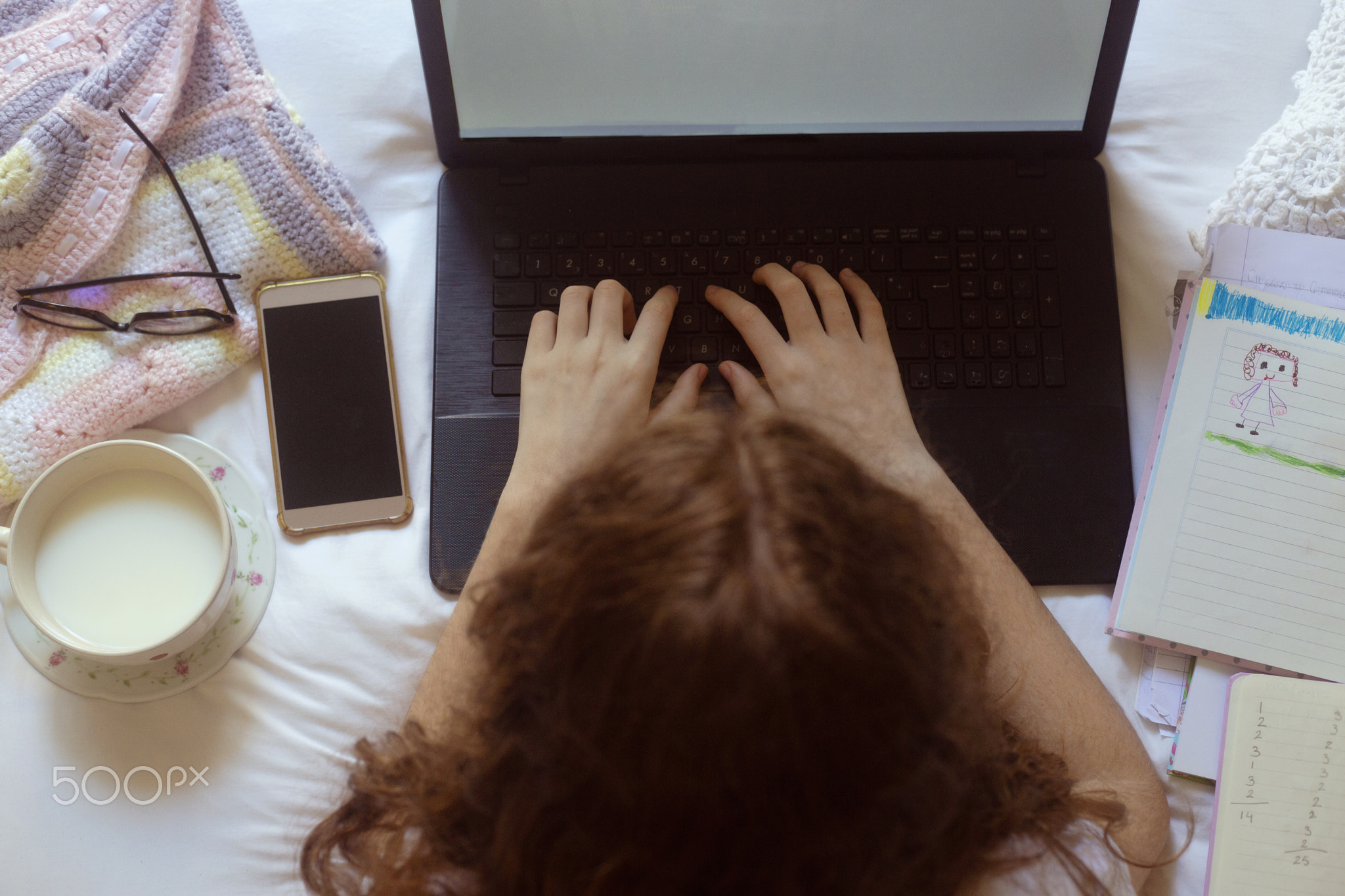 Teenager on her computer